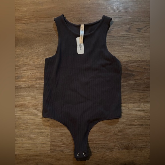 By Together Tops - By Together Body Suit from The Body — NWT